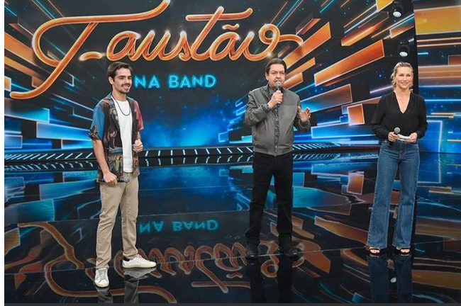  João Guilherme, Faustão e apresentadora Anne Lottermann.