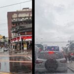 via bloqueada e pessoas na chuva, em São Bernardo