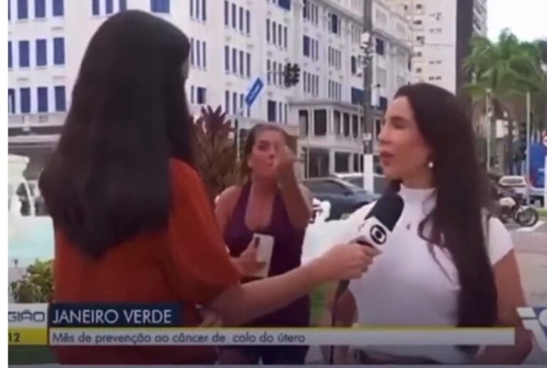 Mulher invade transmissão ao vivo para gritar 'Globo lixo' e faz gesto ofensivo